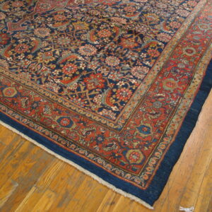 Intricate blue Persian rug design.