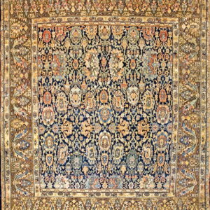 Ornate traditional rug featuring a complex gold and coral floral pattern on a dark navy field.