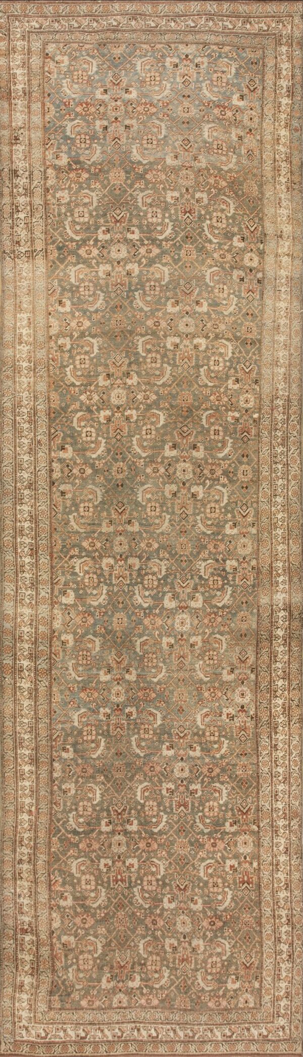 Runner rug featuring a muted green field, detailed patterns, and multi-layered borders in cream and rust.
