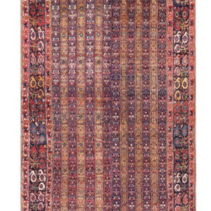 Rectangular rug with dense multicolored vertical stripes and a broad dark border featuring stylized flowers.