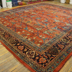 Large ornate red and blue rug