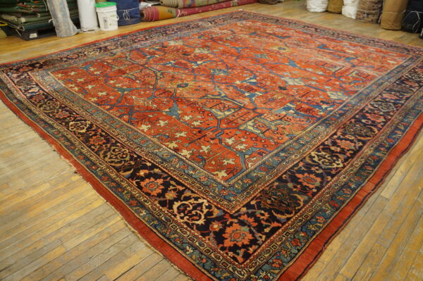 Large ornate red and blue rug