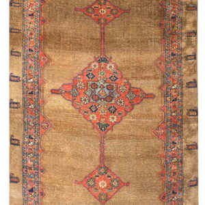 Low-pile, distressed tan runner rug with a rust-colored central pole medallion and multi-colored traditional borders.
