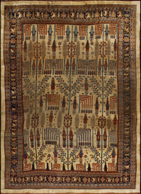 Ornate beige field rug featuring rows of stylized trees, geometric motifs, and a detailed dark navy border.