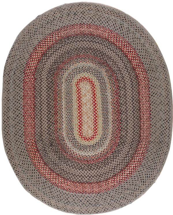 Oval braided rug featuring concentric rings of gray, brown, red, tan, and dark gray colors.
