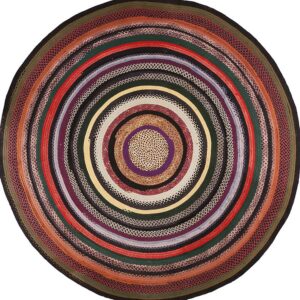 Round braided rug displaying concentric rings of multicolored solids and mixed tweed patterns.
