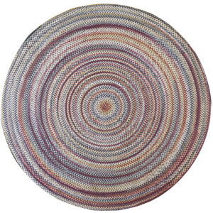 A round braided rug features multicolored concentric circles of navy, red, cream, and gold threads.