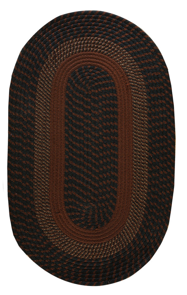 Oval braided rug in bands of solid reddish-brown and alternating dark brown stripes.