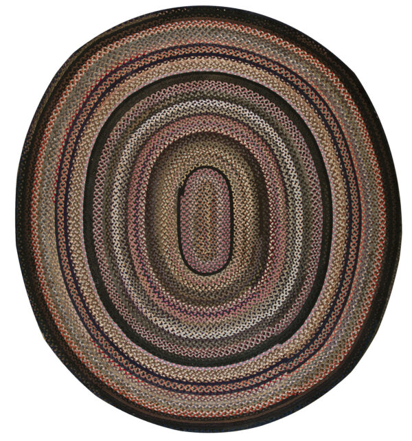 Oval braided rug with concentric rings in variegated shades of brown, black, rose, and gray.