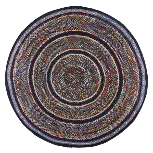 A round braided rug featuring concentric rings of multicolored dark flecks and solid navy blue bands.