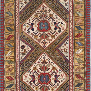 Geometric runner rug in navy, cream, red, and gold, featuring stylized tribal animal and stepped patterns.