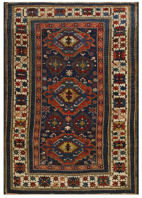 Low pile rug featuring a dark blue field with intricate red, blue, and cream geometric tribal patterns.