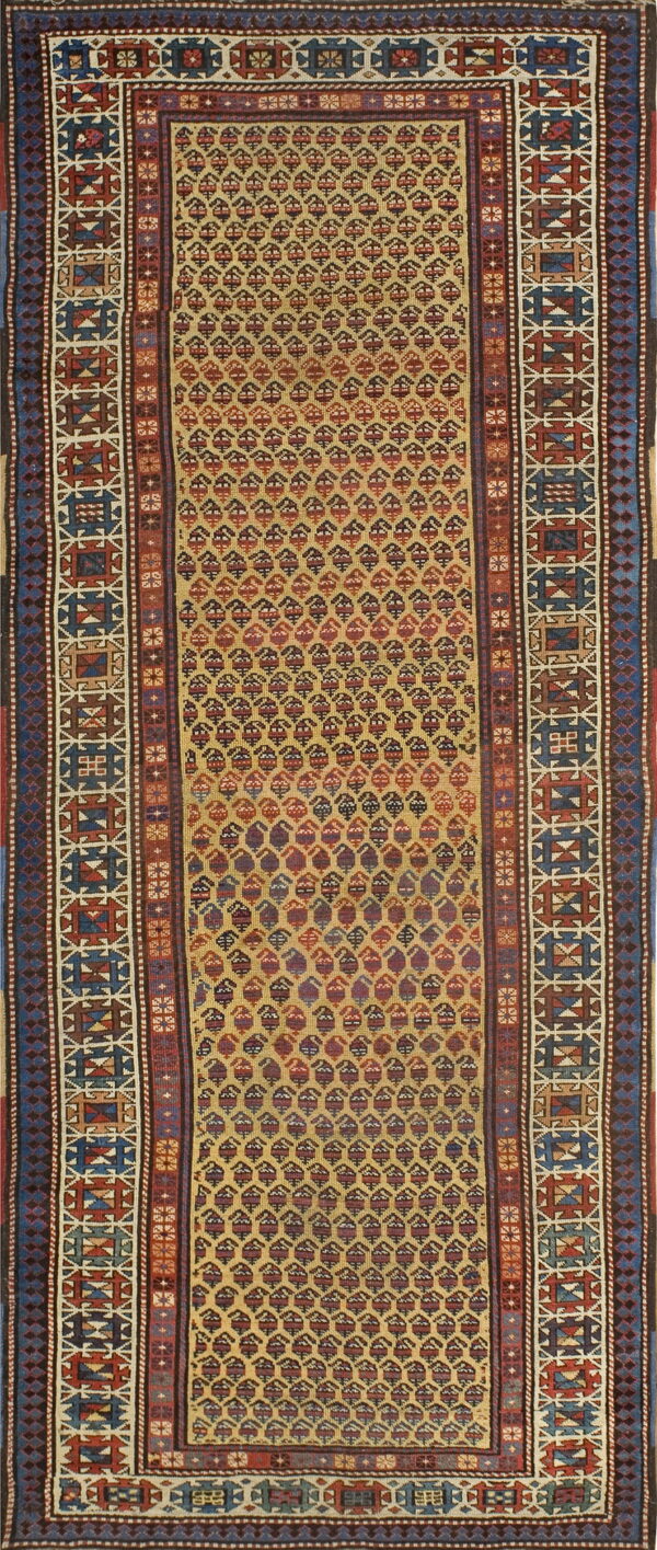 Gold runner rug with a repeating multi-colored boteh pattern and broad geometric borders in blue and red.