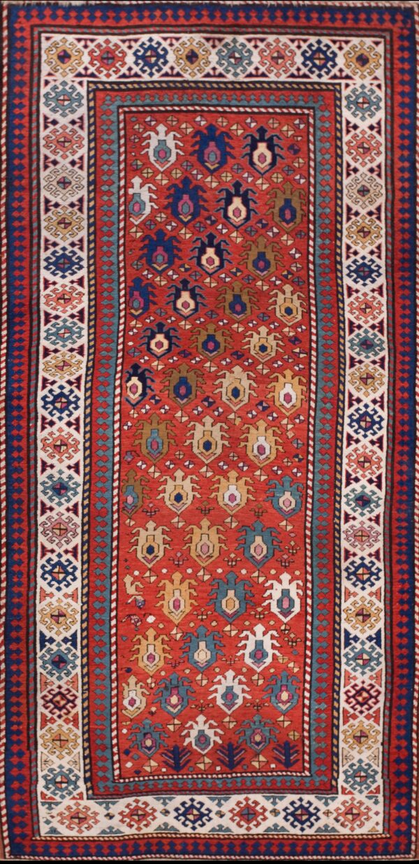 Antique caucasian allover geometric wool hand knotted pile coral / salmon pink 1880s rug