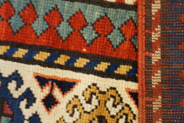 Antique caucasian allover geometric wool hand knotted pile coral / salmon pink 1880s rug - image 2