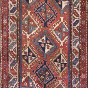 Colorful geometric patterned vintage rug