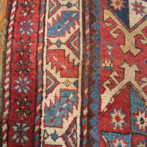 Colorful intricate patterned wool rug