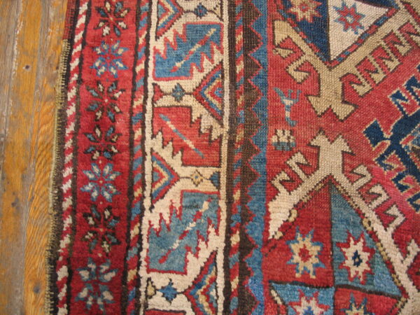 Colorful intricate patterned wool rug