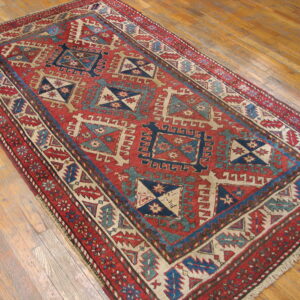 Colorful geometric patterned vintage rug