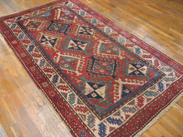 Colorful geometric patterned vintage rug