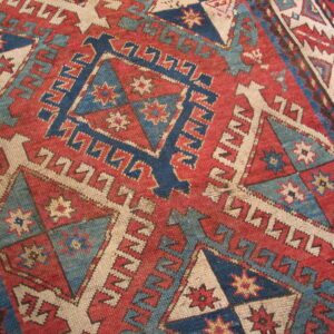Colorful geometric patterned vintage rug