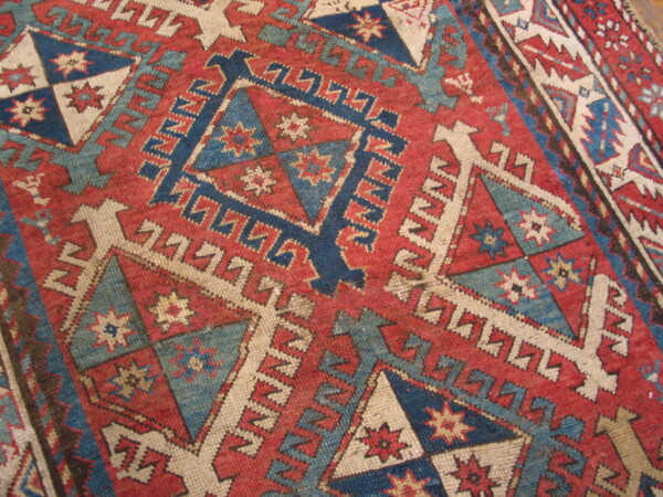 Colorful geometric patterned vintage rug
