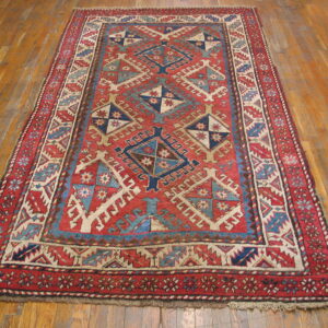 Colorful geometric patterned vintage rug