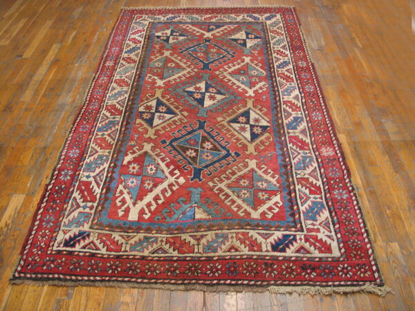 Colorful geometric patterned vintage rug