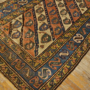 Colorful traditional patterned vintage rug