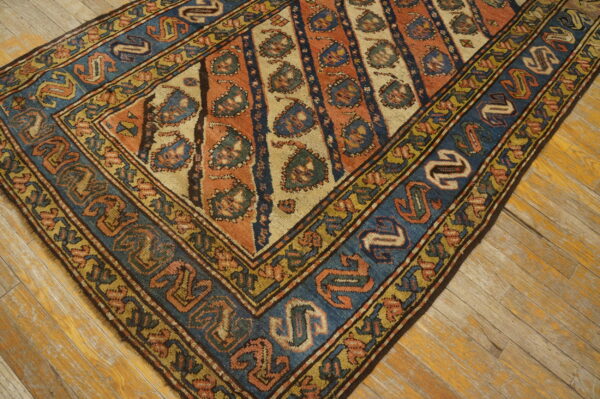 Colorful traditional patterned vintage rug