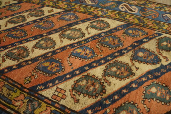 Colorful patterned antique caucasian rug