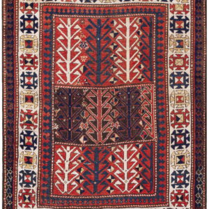 Red, blue, and cream tribal rug with stacked panels featuring stylized tree motifs.