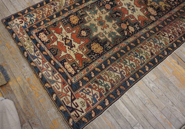 Colorful intricate patterned wool rug