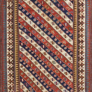 Runner rug featuring geometric diagonal stripes in red, navy, and cream with elaborate multi-layered borders.