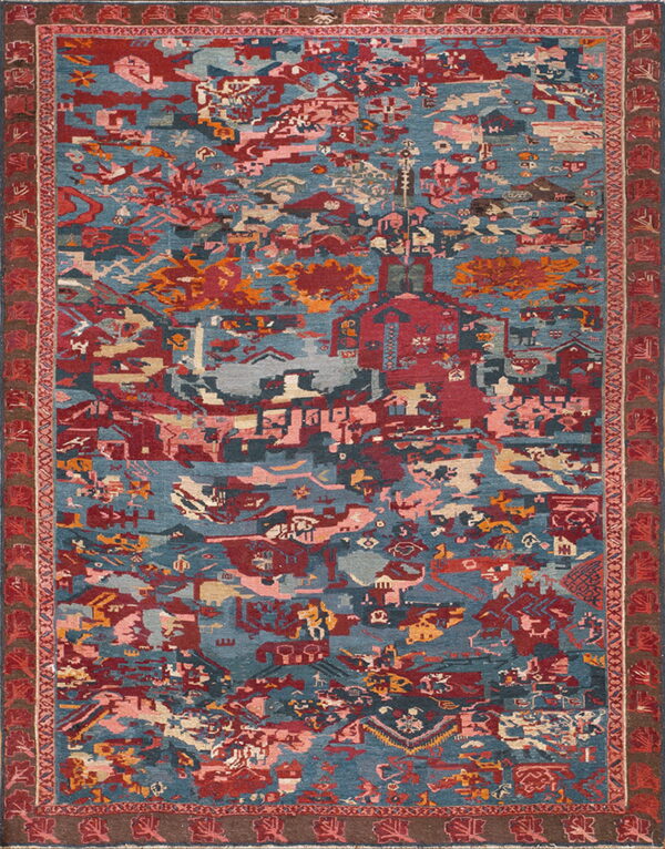 Low-pile rug featuring dense, abstract motifs in blue, red, dusty pink, and orange with a wide patterned border.