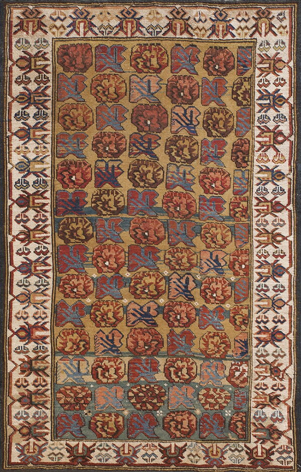 Low-pile rug featuring repeating rust and blue tribal motifs on a gold field with thick cream geometric borders.