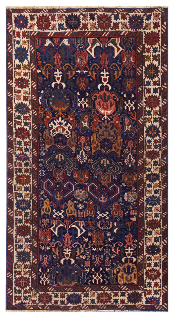 Dark blue rug with a complex, multi-colored tribal geometric pattern and wide ivory borders.