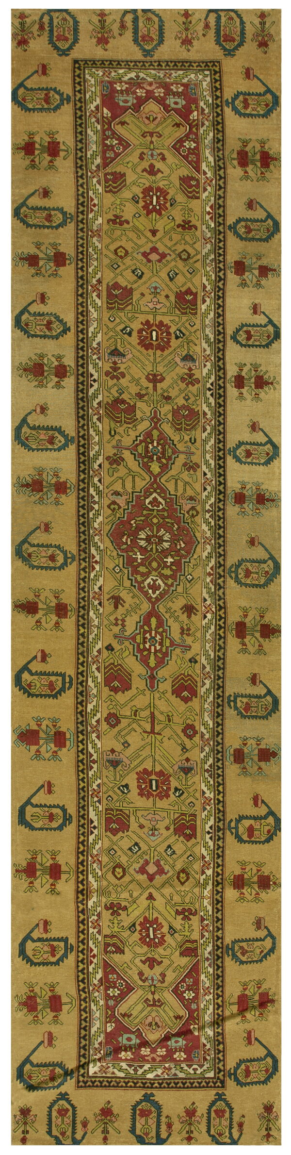A gold runner rug featuring stylized geometric motifs in red, teal blue, and green.