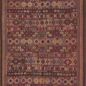 Burgundy flatwoven rug featuring horizontal bands of dense, multicolored geometric patterns and tribal motifs.