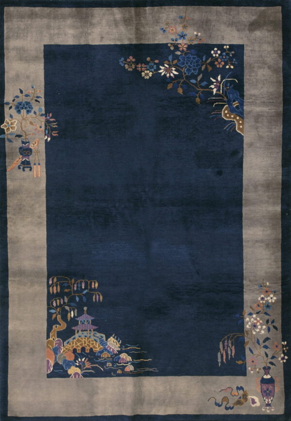 Plush dark blue rug with a gray border accented by multicolored stylized flowers and landscape scenes.
