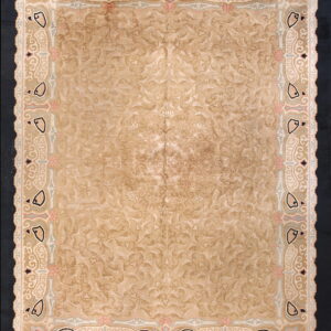 Distressed beige rug featuring a subtle field pattern and an ornate border with pink, black, and blue accents.