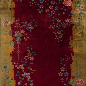 Traditional rug with a red center, gold border, and sprawling colorful floral and lantern motifs.