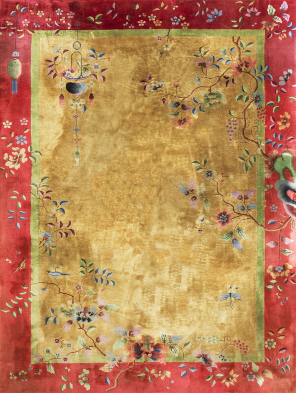 Gold rug with high sheen, thick red border, and multicolored flowering vines, birds, and lanterns.