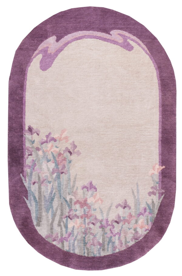 Oval rug with a magenta border, beige center, and a floral iris pattern along the bottom edge.