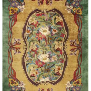 A richly colored rug displaying gold, green, and vibrant floral motifs bordered by curling red ribbons.