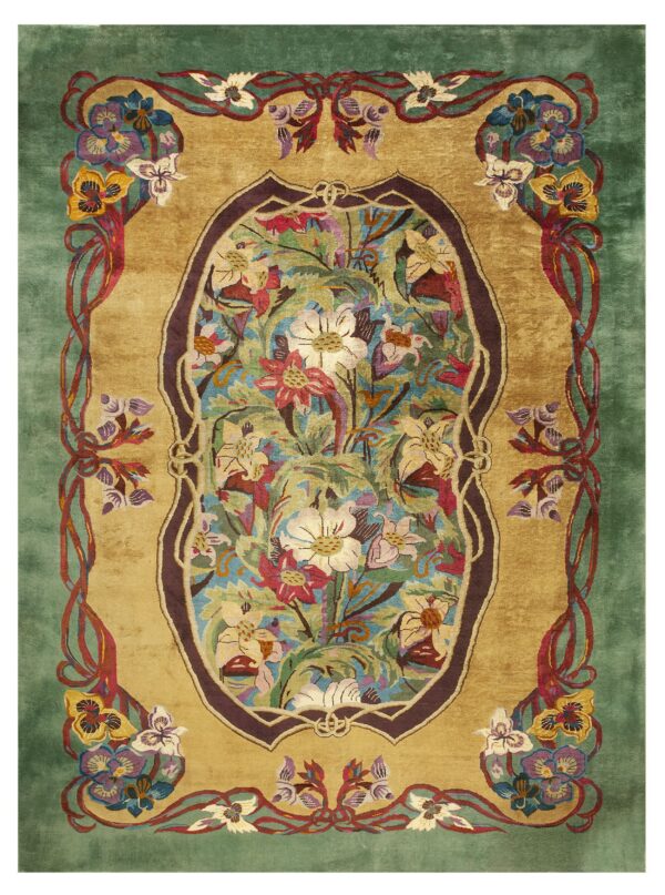 A richly colored rug displaying gold, green, and vibrant floral motifs bordered by curling red ribbons.