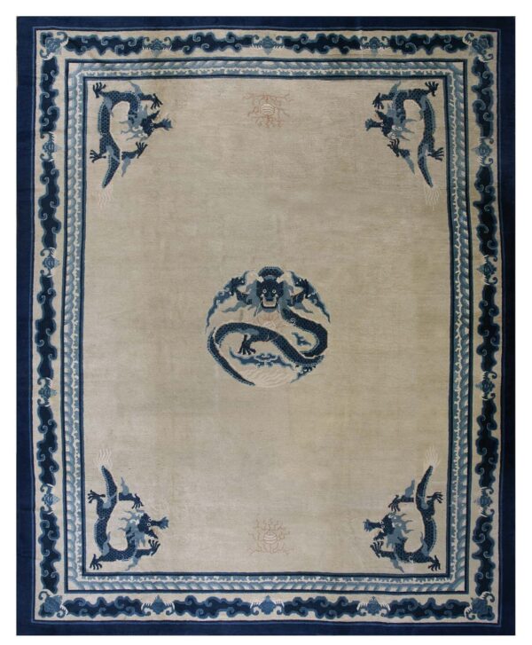 Cream rug with blue multiple borders, featuring dragons and wave motifs throughout the pattern.