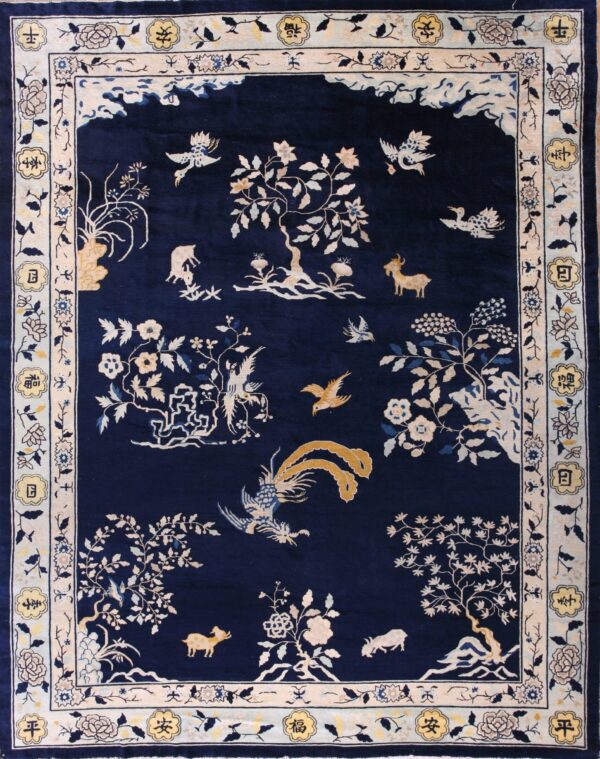 Deep blue rug with a detailed scenic pattern of cream birds, trees, goats, and a character-filled border.