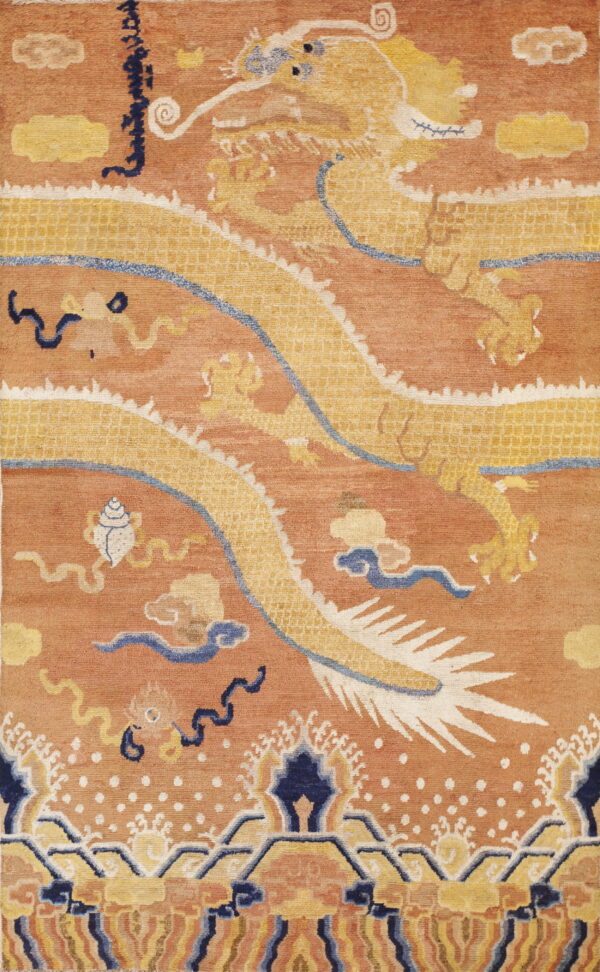Terracotta rug with a golden yellow dragon design, detailed blue clouds, and patterned lower border.