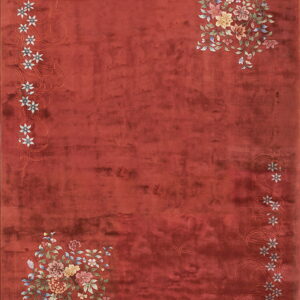 Rust-toned plush rug with colorful floral bouquets in two corners and a border of small white flowers.